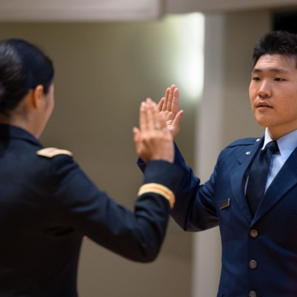 Receiving commissions, ROTC graduates commit to service